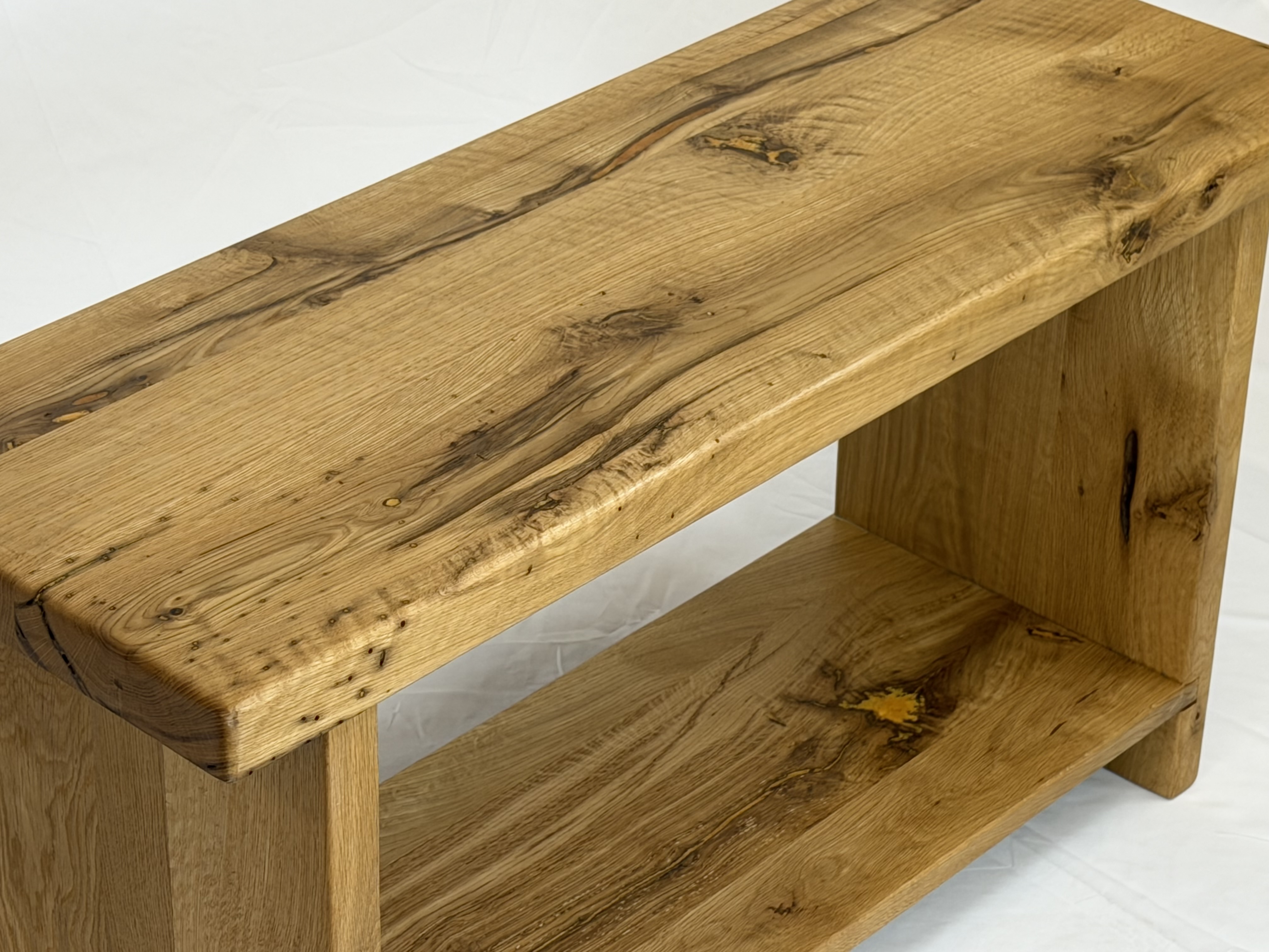 Close-up detail of natural top grain figure and brass resin kintsugi highlights