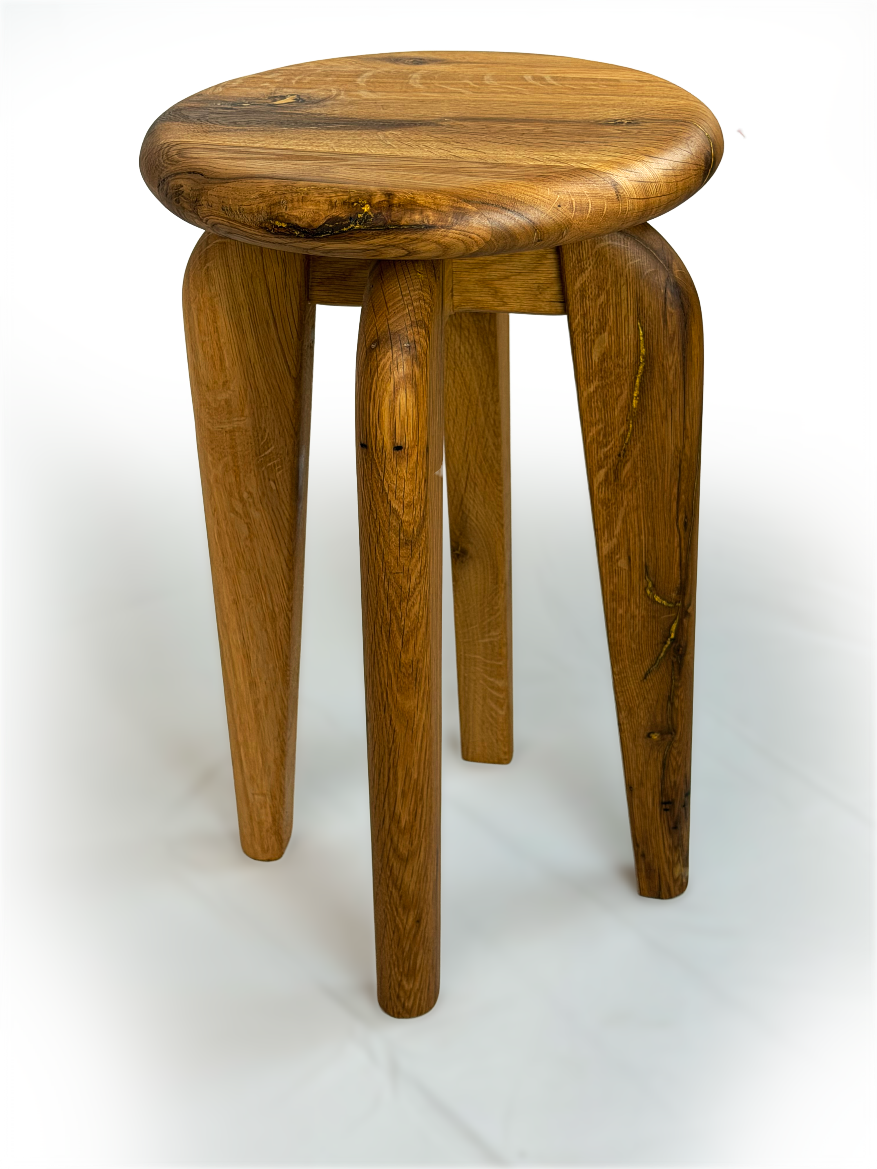 Side profile emphasizing turned leg tapers and subtle timber figure